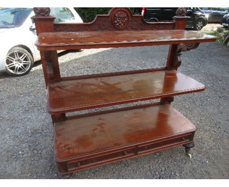 A Victorian style mahogany three tiered buffet, veneer and moulding missing, width 54ins x height 57ins