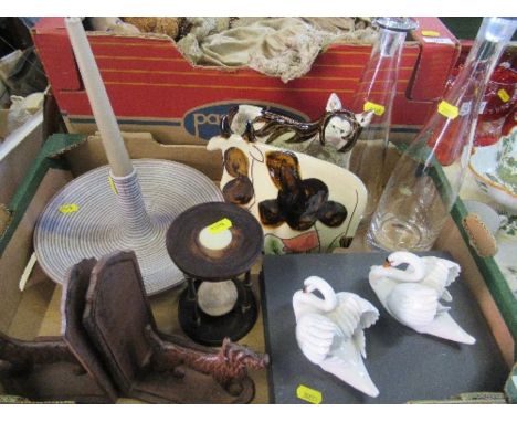 A box of assorted sundries to include dog bookends, two Royal Doulton swan models, egg timer, decanters, candle stick, etc.