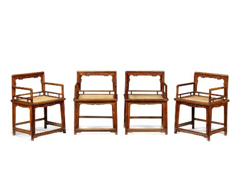 A rare set of four huanghuali armchairs, meiguiyi18th/19th centuryEach with a rectangular top rail mortised and tenoned to th