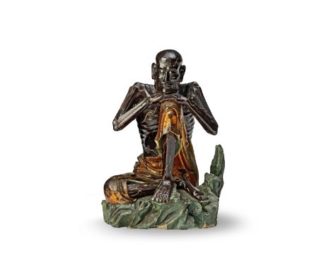 A rare large lacquered-wood figure of an Ascetic Luohan18th century The ascetic figure with a tonsured head and serene and me