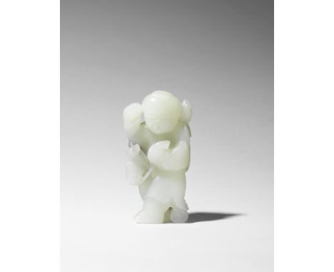 A fine white and grey jade carving of a boy on hobby-horse17th/18th century Deftly carved as a standing boy with finely incis