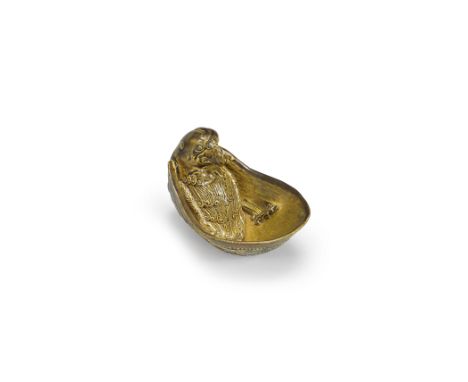 A rare ochre glazed 'Parrot' cupTang DynastyOf shallow oval form, one end formed as a parrot lying on its back, the finely in