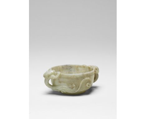 A rare pale green and russet jade 'Chilong' cupMing Dynasty Deftly carved with deep rounded sides rising from a short straigh