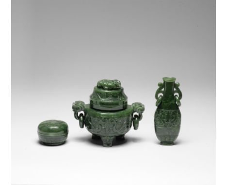 A spinach-green jade three-piece incense setLate Qing DynastyComprising an incense burner and cover, carved around the body w