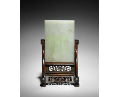 A rare pale green jade imperial-poem-inscribed double-sided panelQianlongThe rectangular plaque probably originally a leaf in