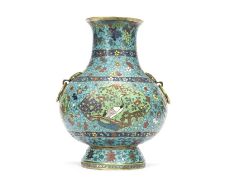 A cloisonné enamel baluster vase, Hu17th century Well cast with a globular body supported on a spreading foot rising to a wai