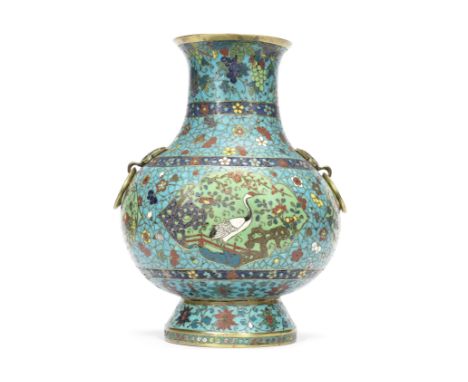 A cloisonné enamel baluster vase, Hu17th century Well cast with a globular body supported on a spreading foot rising to a wai