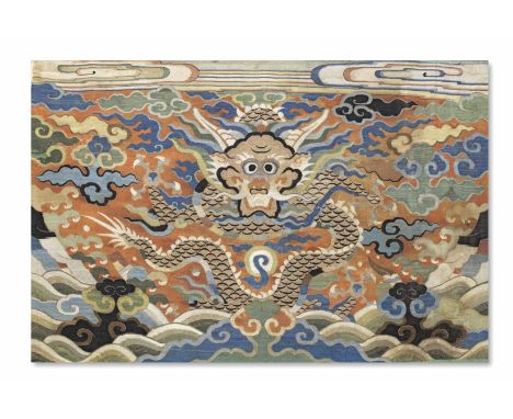 A rare silk kesi 'dragon' panelWanliThe rectangular panel finely decorated with a large front-facing dragon coiling around a 