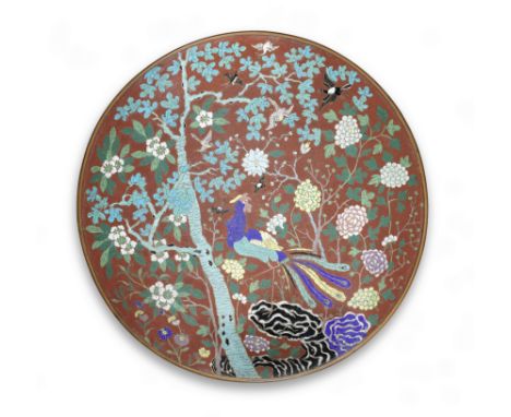 A very large cloisonné enamel 'phoenix' dish19th centuryThe interior decorated with a phoenix perching on a prunus branch iss