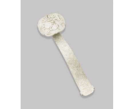 A mottled pale green jade sceptre, ruyiLate Qing Dynasty/Republic PeriodElegantly carved as a slender curved shaft leading up