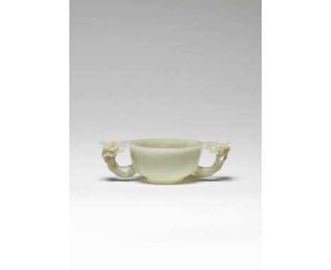 A pale green jade two-handled 'prunus' cupMing DynastySmoothly carved with deep rounded sides, supported on a short slightly 