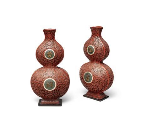 A pair of rare large cinnabar lacquer double-gourd 'Daji' vasesQianlongBoth vases with slightly flattened sides and narrow wa