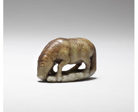 A pale green and russet jade carving of a horseMing DynastyFinely carved in the form of a horse with its head lowered to drin