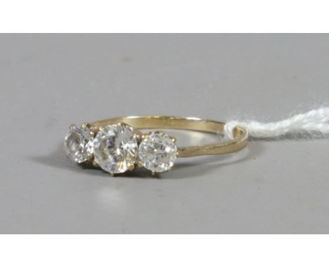 A ladies 9ct gold and paste set three stone dress ring, UK size N.5. 1.75 grams.