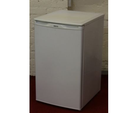 A white enamel Beko fridge.