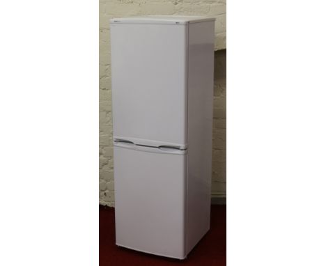 A white enamel Proline slim fridge freezer.