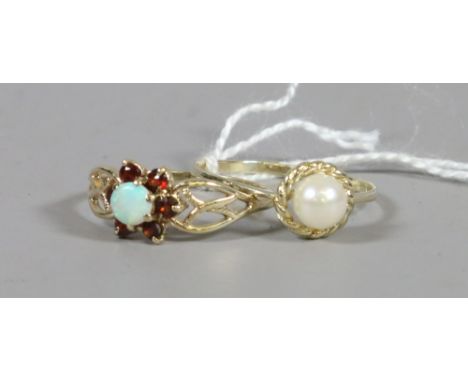 A 9ct gold opal and garnet ring O1/2 and a 9ct gold and pearl ring R.