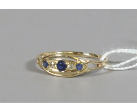 An Art Deco style 18ct gold sapphire and diamond ring, ring size Q.