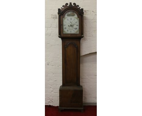 A Regency mahogany eight day longcase clock by Miraham Hunt with fret carved pediment fluted column supports and painted arch