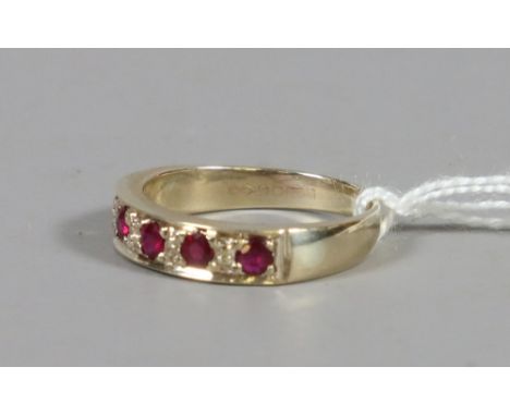 A 9ct gold ruby and diamond half eternity ring size P.