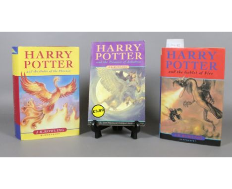 Two first edition Harry Potter books Order of the Phoenix and Goblet of Fire, along with paper back copy Harry Potter and the