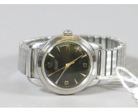 A stainless steel cased manual wind wristwatch with black dial and second sweep finger by Tissot.