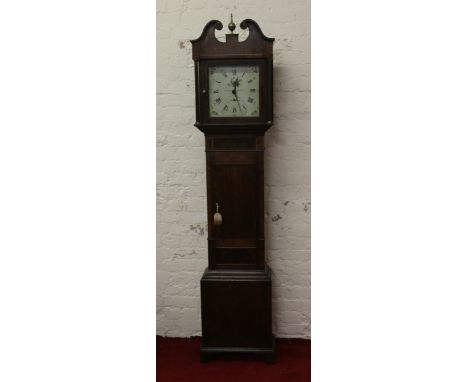 A George III oak and mahogany inlaid thirty hour longcase clock by William Newby of Kendal, with fluted columns and swan neck