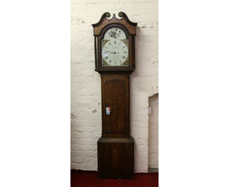A George III oak eight day longcase clock by Thomas Wallace Brampton with painted arch top dial and subsidiary seconds, strik