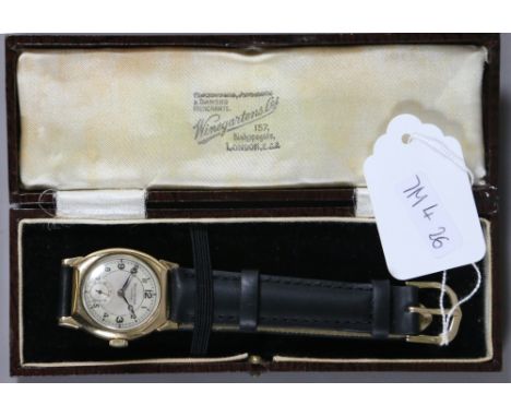 A gentlemens Bravingtons of London manual wristwatch in 9 carat gold case with subsidiary seconds dial.