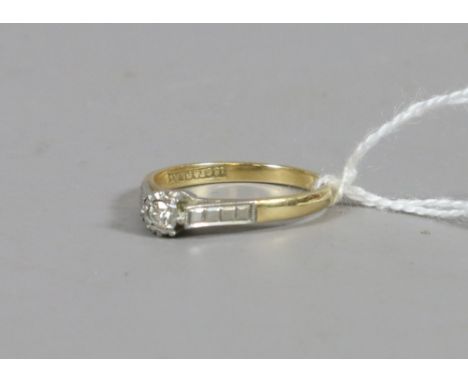 A ladies 18ct gold and platinum shanked illusion set solitaire diamond ring UK size L.5. 2.37 grams.