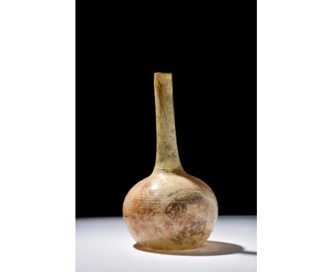 Ca. 1100-1200 AD.A glass sprinkler flask, displaying a soft, pale tone. This piece exhibits an onion-shaped lower body, flawl