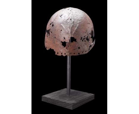 Ca. 11th-12th century AD.An iron skull-cap of hemispherical form, crafted with precision to fit the contours of the human hea