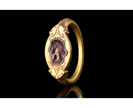 Ca. late 2nd century AD.A gold ring with a D-shaped design, characterized by a round-section shank that expands at the should