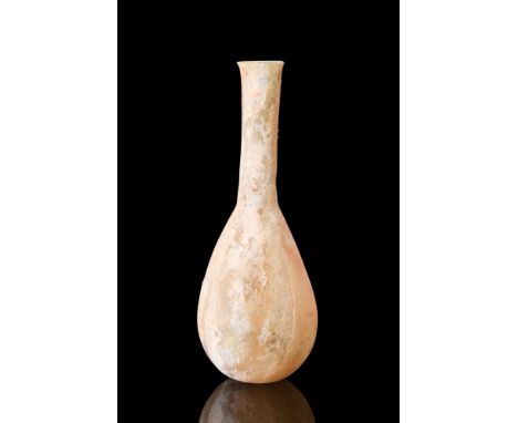 Ca. 1-300 AD.A glass unguentarium featuring a beautiful piriform shape with a long, tubular neck. This flask would have been 