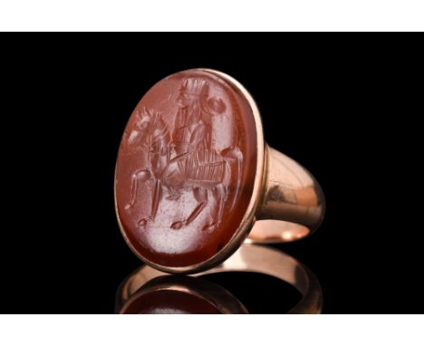 Ca. 500 - 600 AD.A rare gold ring featuring an exquisite intaglio of a Sasanian horserider seated with ease atop his mount, h