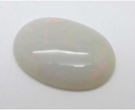 An unmounted opal, over 24 carats, 22mm x 29mm 
