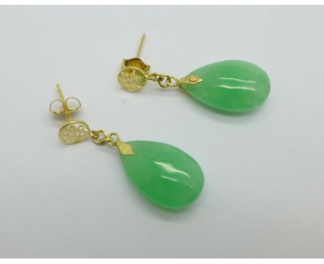 A pair of 9ct gold and jade earrings 