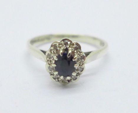 A 9ct white gold sapphire and diamond cluster ring, 2g, L 