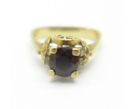 A 9ct gold garnet solitaire ring, 3.4g, L 