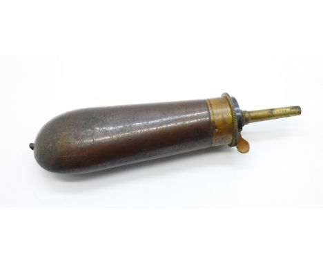 An all metal powder flask, marked 'made in Italy' 