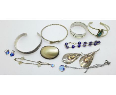 Silver and white metal jewellery and a silver napkin ring 