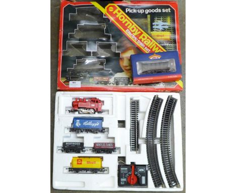 A Hornby Railways electric train set, R680, Pick-up Goods Set, and a Bachmann model railway wagon 