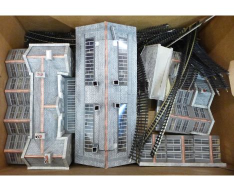 A model railway train station and spare track 