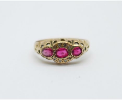 A 9ct gold ring set with diamonds and pink stones, Chester 1916, 1.4g, O 