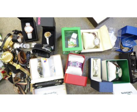 A collection of watches including Rotary and Fossil, some boxed 
