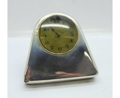 A silver cased clock, Birmingham 1925, (case a/f at bottom front corners) 