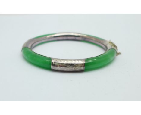 A silver and jade bangle 
