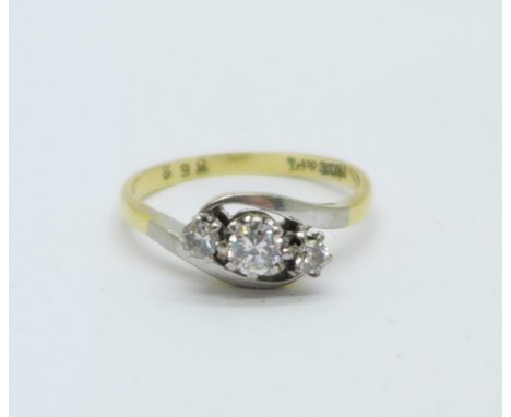 An 18ct gold, platinum set three stone diamond ring, 2.8g, N, centre stone approximately 0.25 carat 