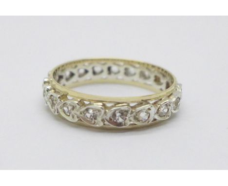 A 9ct gold and silver, white stone eternity ring, R 