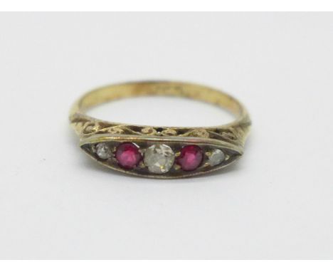 An 18ct gold ring set with two rubies, two diamonds and one small replacement white stone, 2.1g, N 